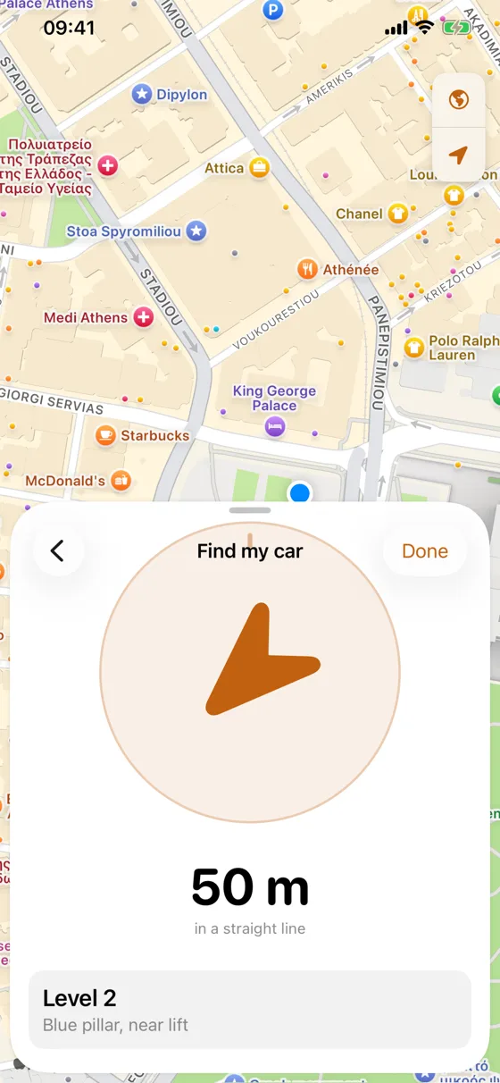 The compass screen showing a large arrow pointing towards the car and a distance of 50 metres.
